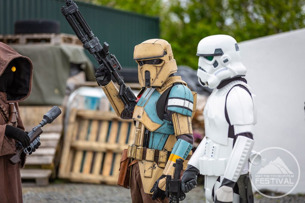 An intricate costume being examined