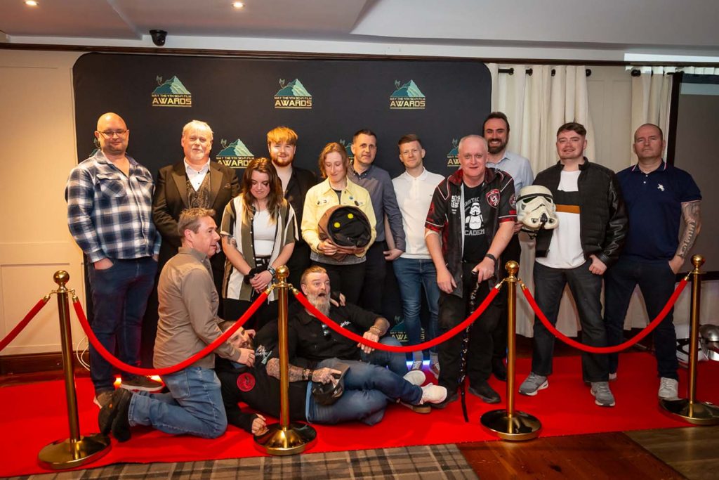 Awards gala guests posing for photos