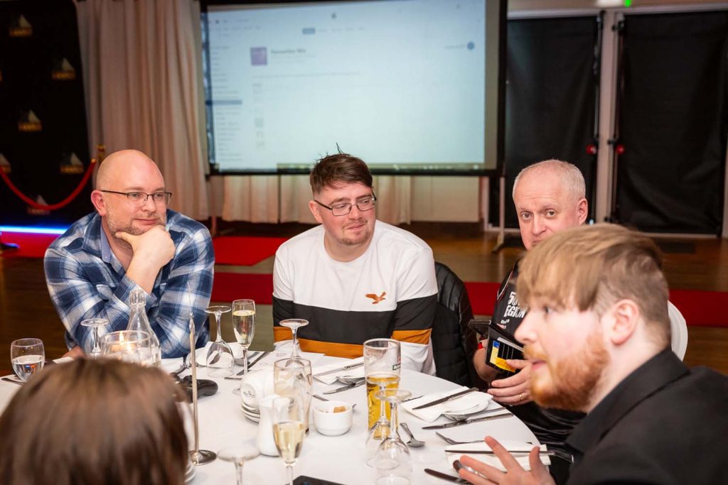 Groups having a conversation during the awards gala