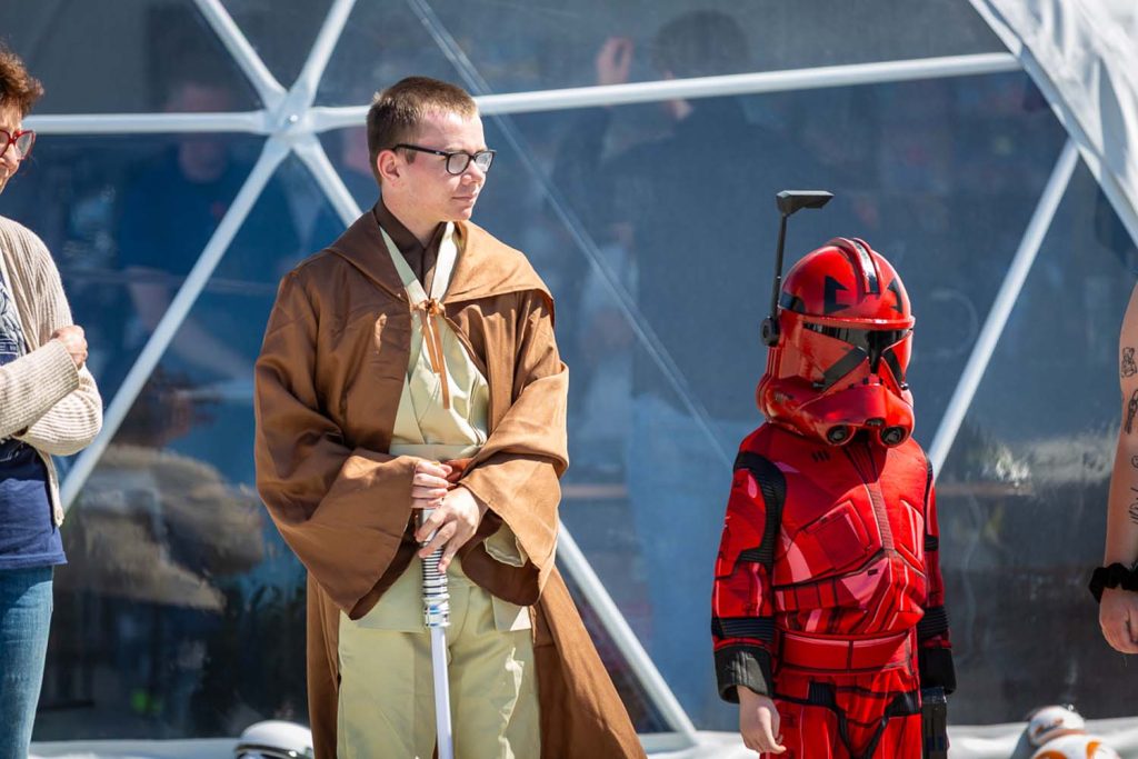 Two young children outside the film festival